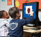 Language Builder Software- A young boy and girl looking at a picture of an apple on a computer screen